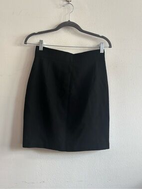 Juan silk black mini skirt with button detail in the back